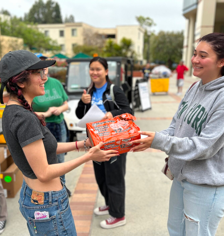 Students exchanging donations during Bruin Move-Out