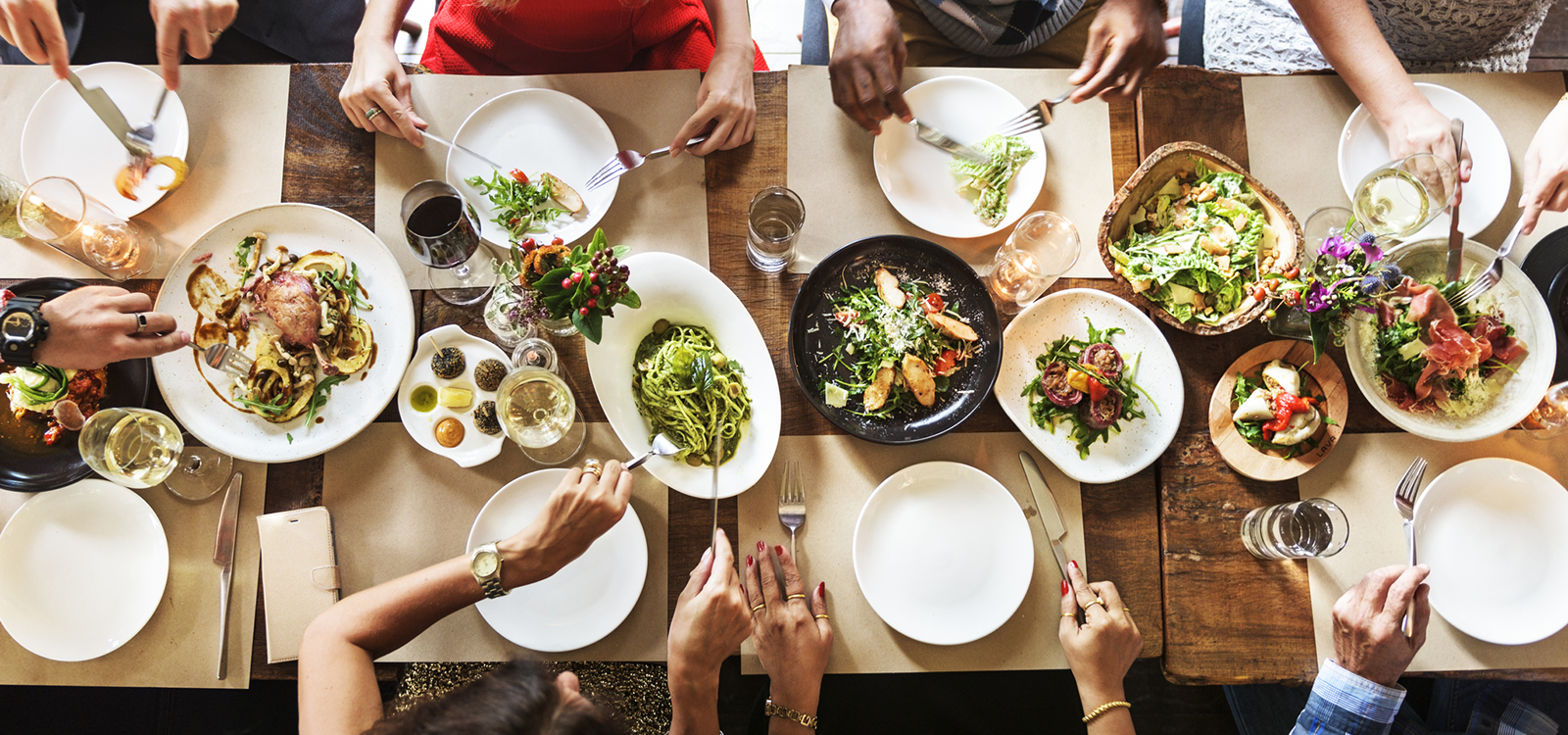 A variety of dinner plates at an 8-person setting