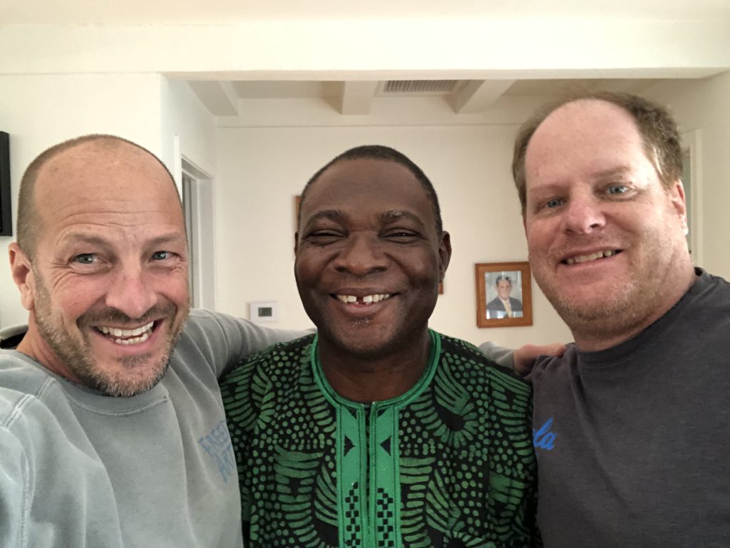 Larry Thrall, Pastor Isaac Komolafe and Monty Minchin